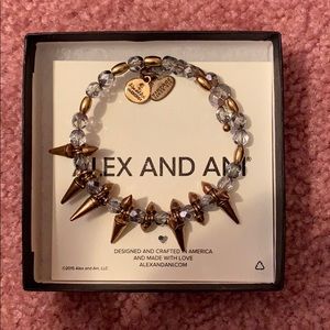 Alex and Ani spike bracelet in gold and purple